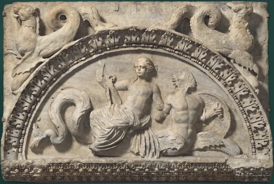 Roman marble relief of a sea-nymph riding a fish-tailed Triton