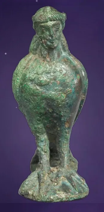 A green bronze siren standing upright